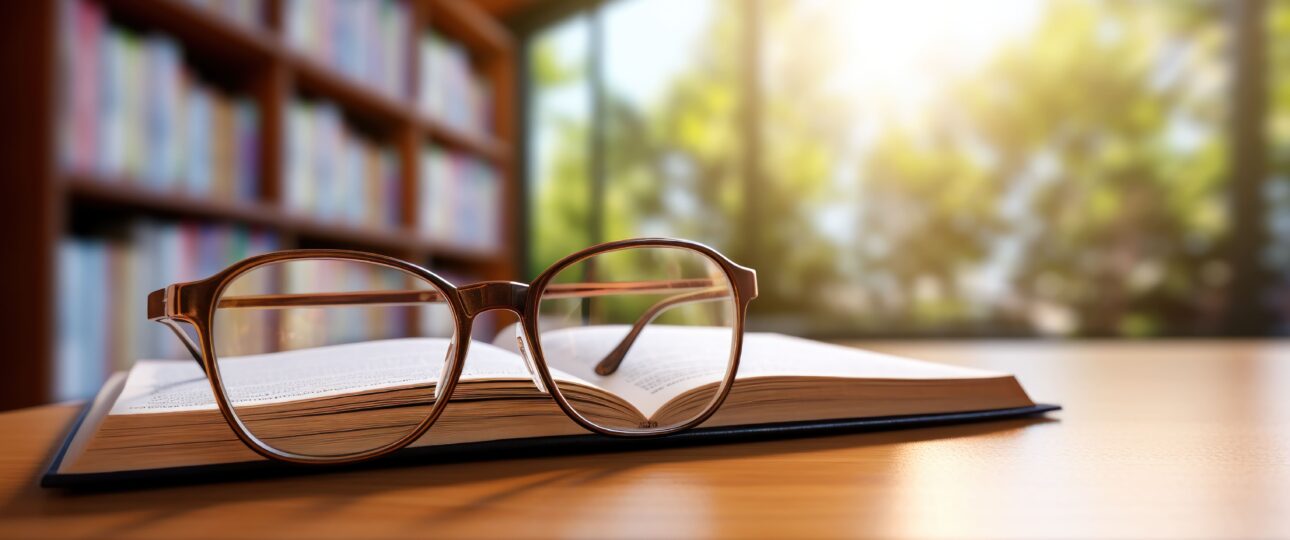 pair-eyeglasses-with-bookshelf