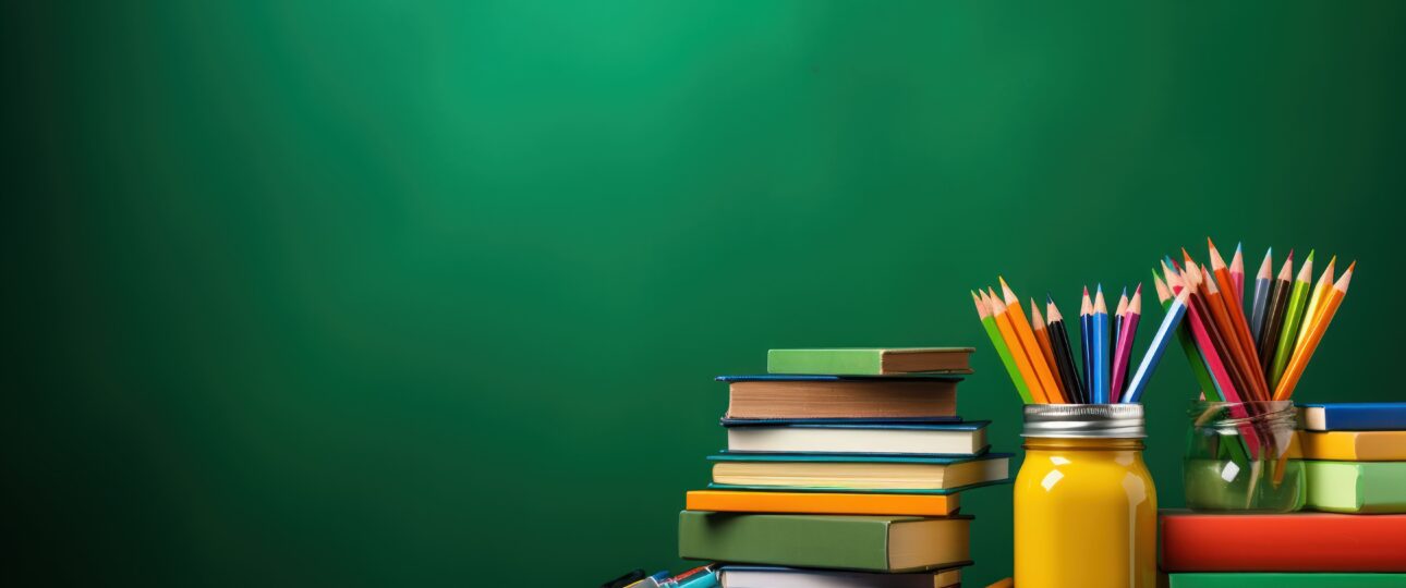 pencils-wire-holder-books-near-chalkboard-back-school